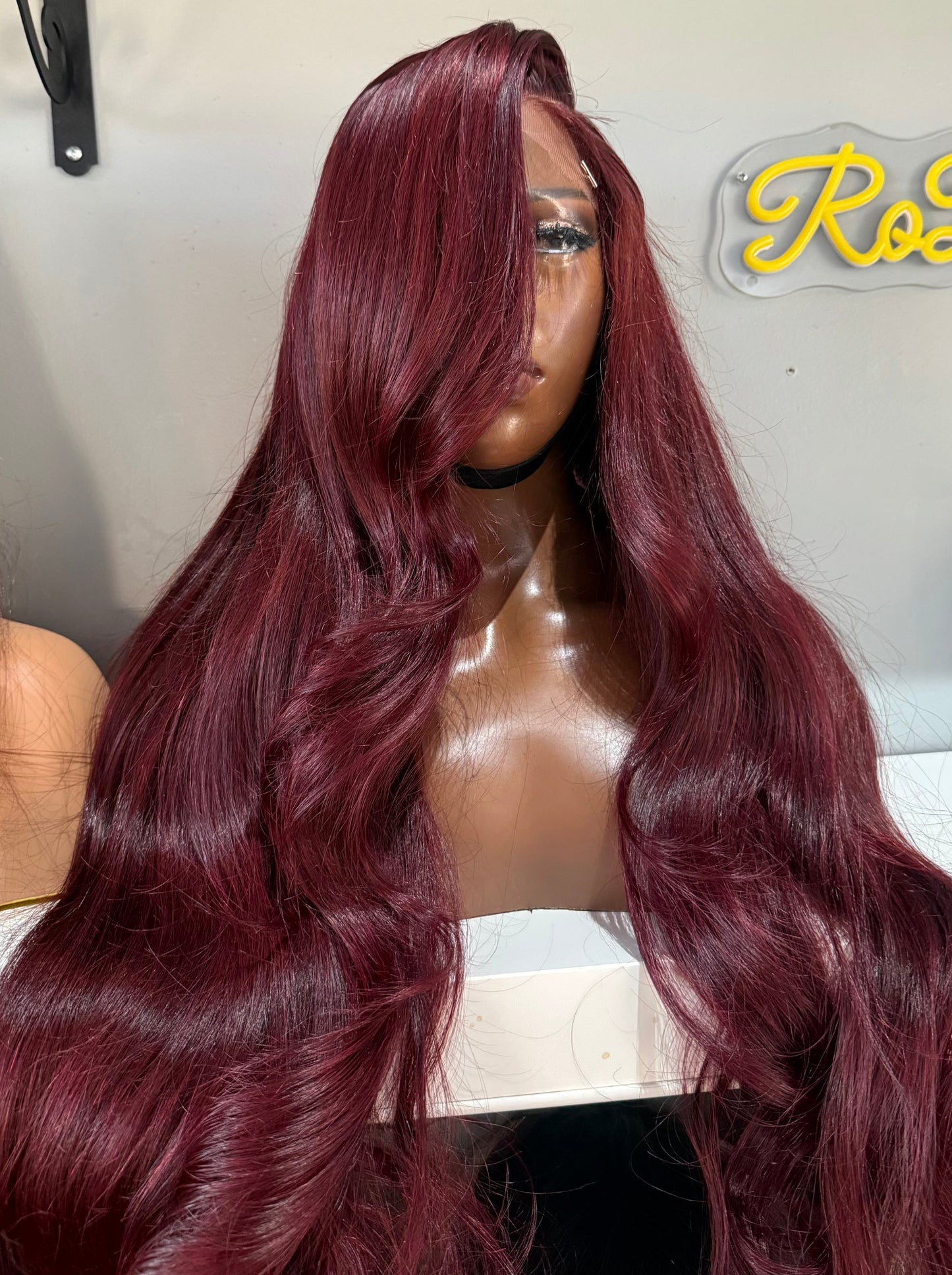 Dark burgundy closure wig.