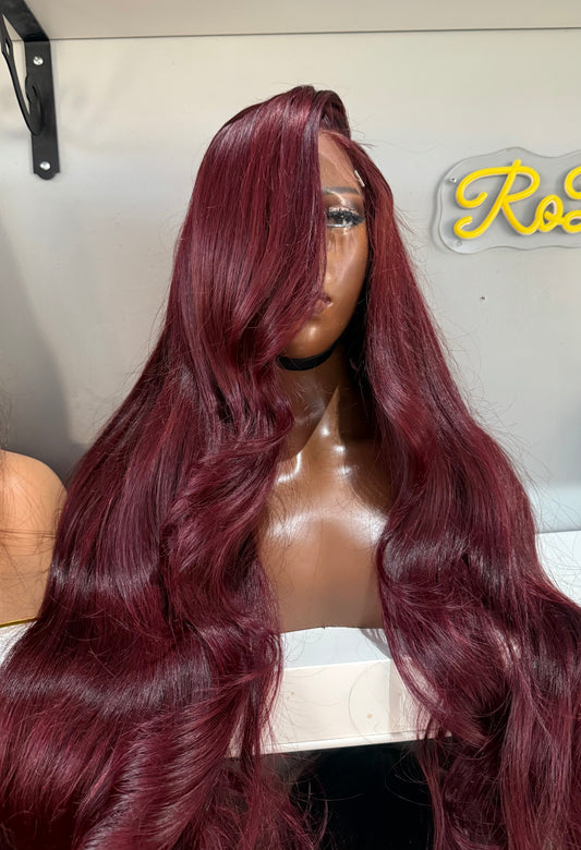 Dark burgundy closure wig.