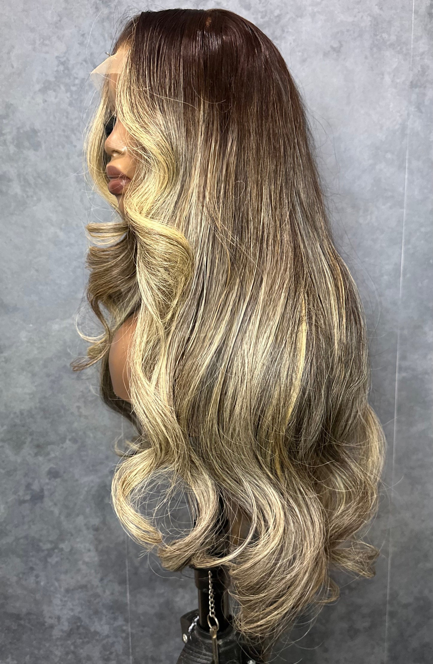 Raw Indian wig with highlights made with 3 bundles, side view.