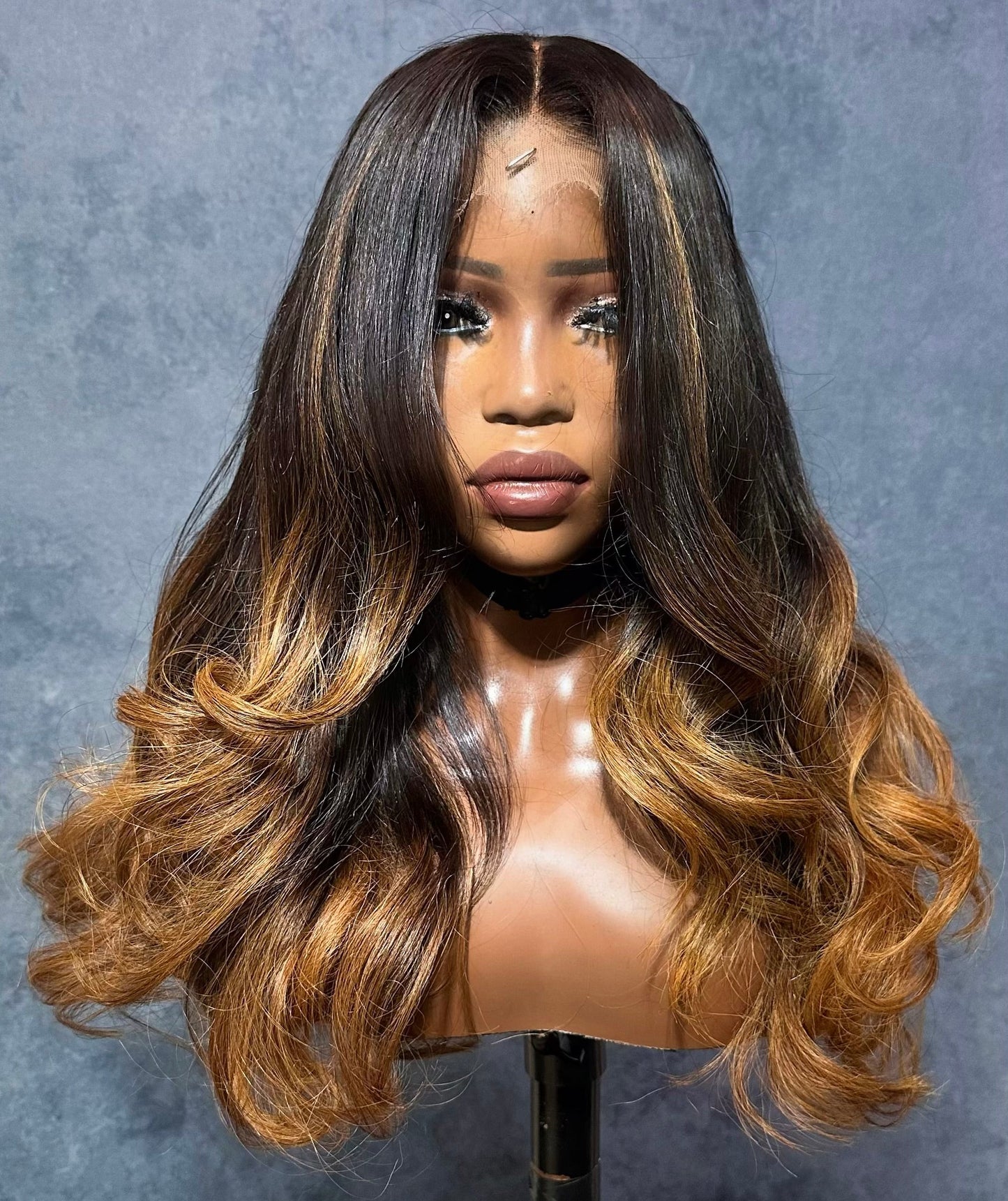 Virgin hair wig with brown highlights and is 180% density.