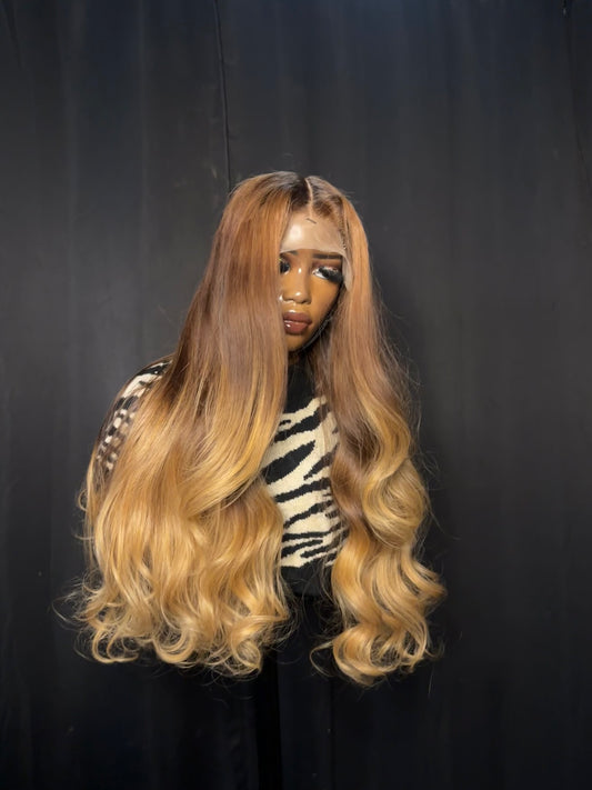 Raw hair wig with mixed highlights; front quarter view.