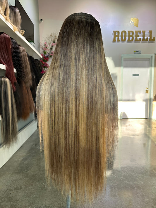 Raw hair with highlights rear view.