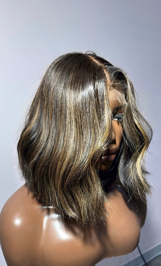 Short wig with highlights.
