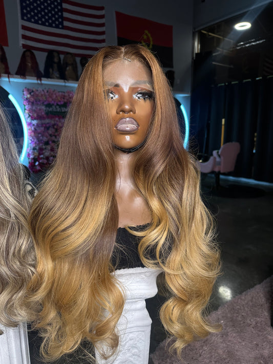 Raw hair wig with mixed highlights; front lower view.