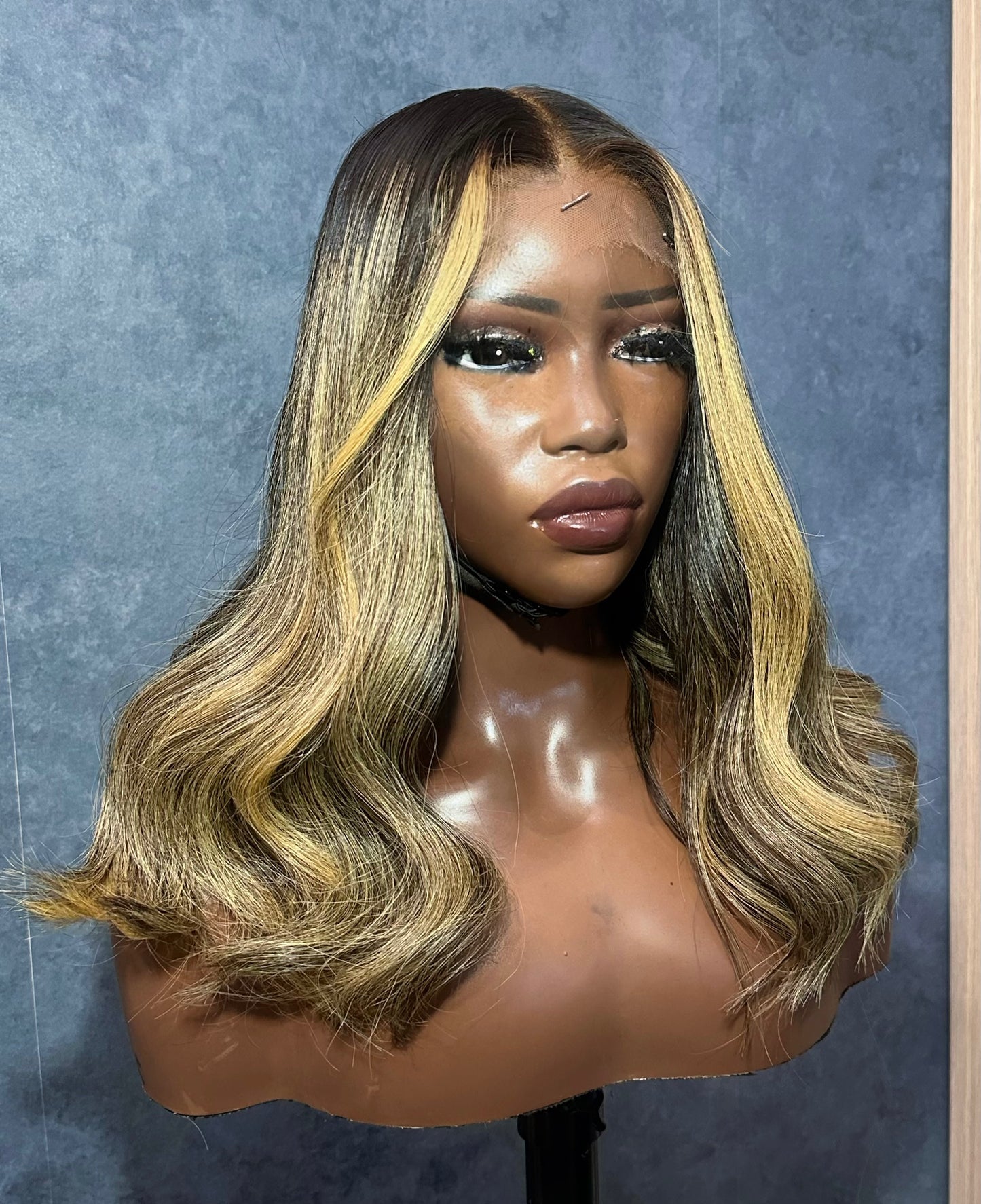 Raw hair with highlights, 14” long.