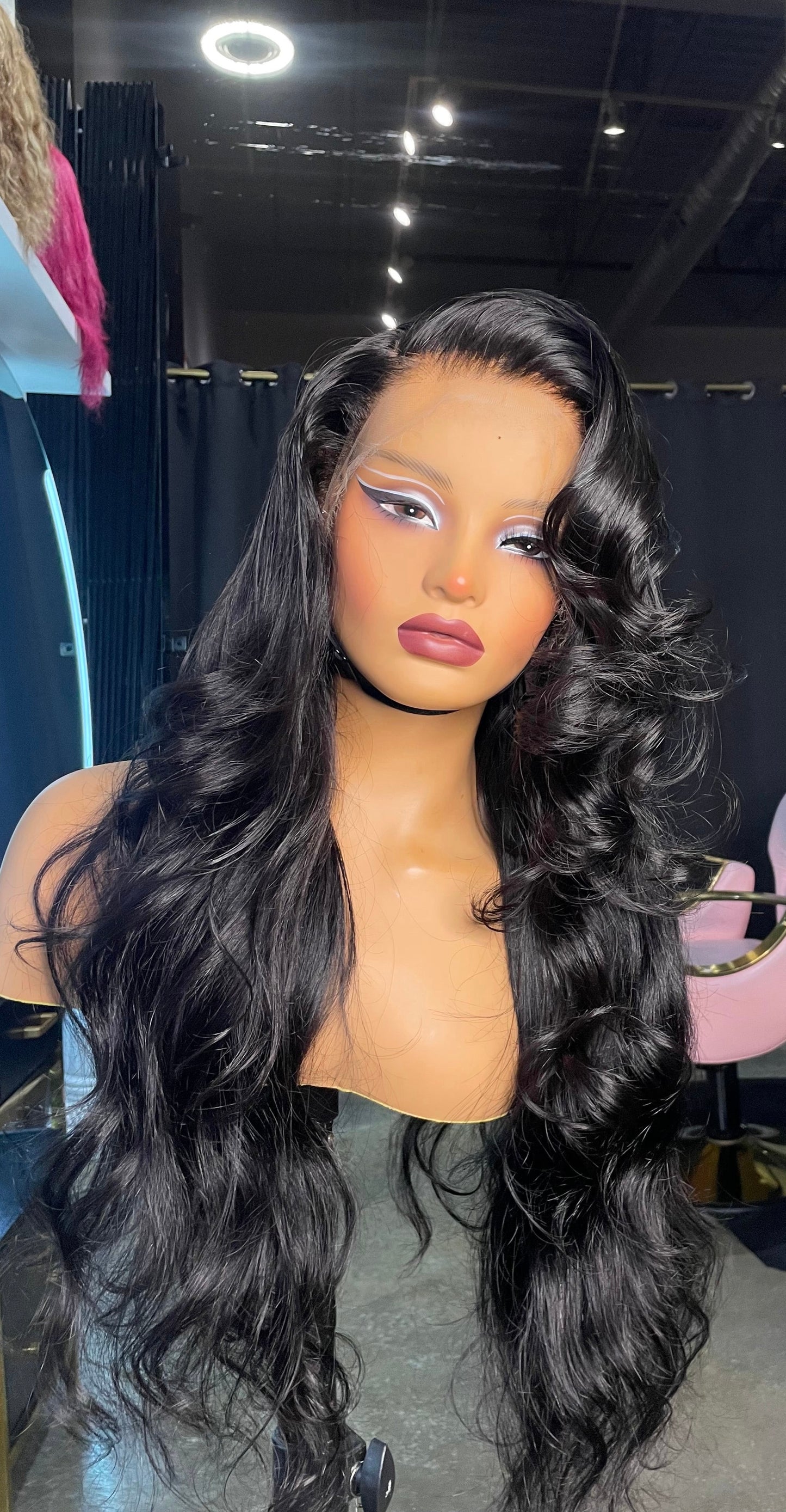 Natural color body wave texture wig with layers.