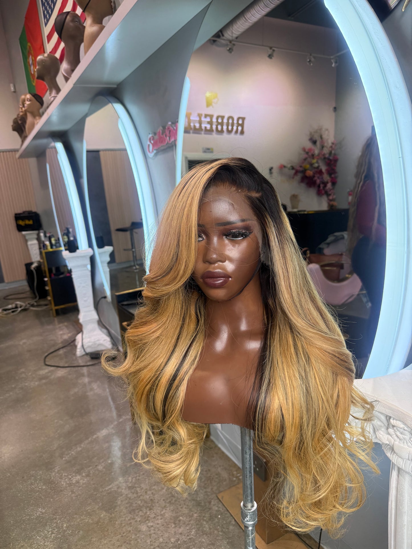 Right side front view of blonde raw Vietnamese wig made with 3 bundles.