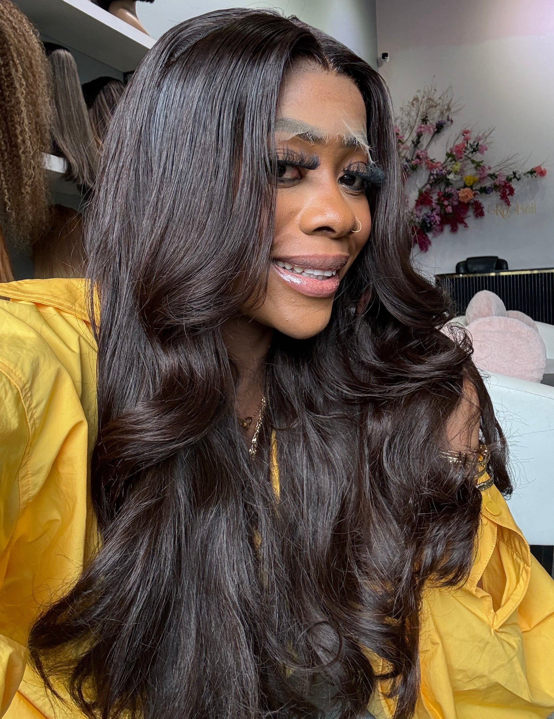 A body wave texture wig made with raw Vietnamese hair from a single source donor with layers and curls.