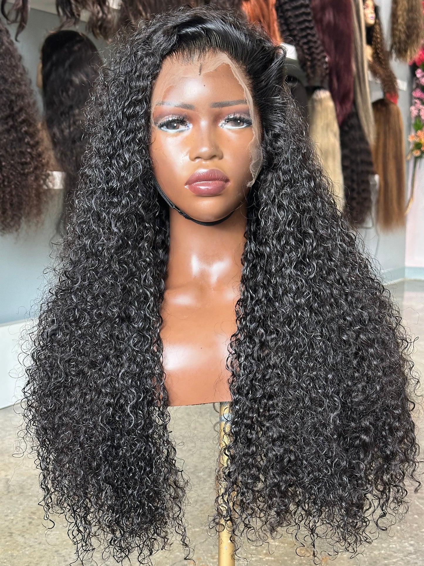 Front view of Burmese curly texture natural color wig.