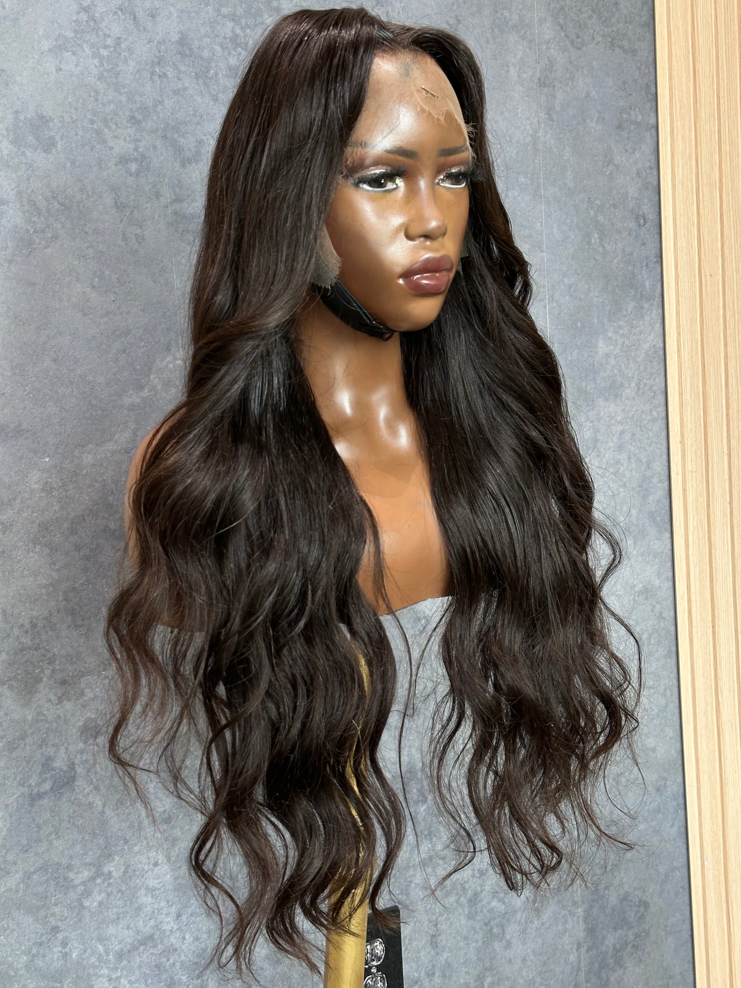 Left side view of lace frontal wig made with 3 bundles and virgin human hair.