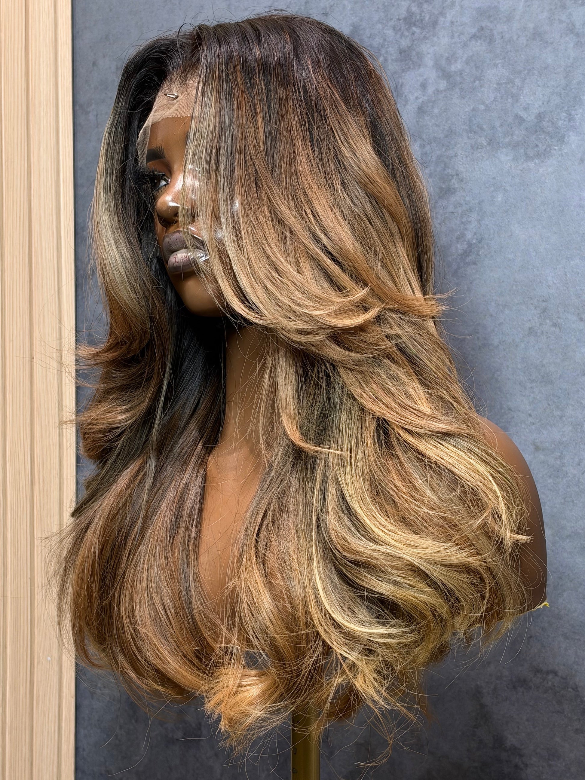 Left side view of 3 bundle raw Indian hair wig made with an HD lace frontal 13X4.