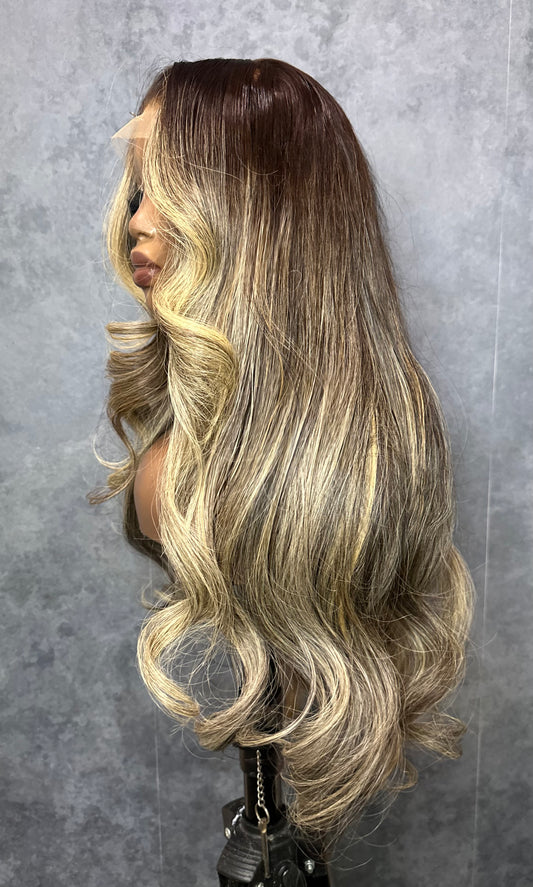 Raw Indian wig with highlights made with 3 bundles, side view.