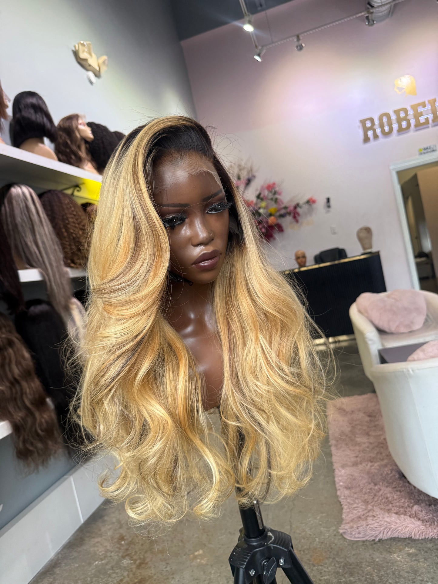 Front left side view of 3 bundle frontal raw wig. 
