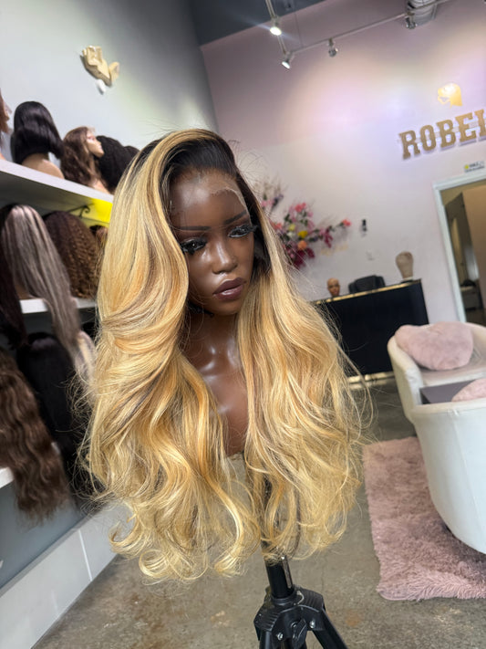 Front left side view of 3 bundle frontal raw wig. 