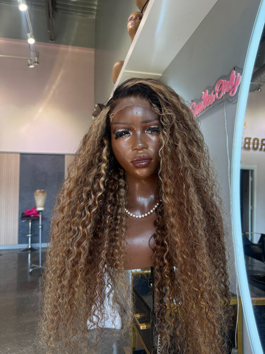Mannequin head with long braided hair in a store setting