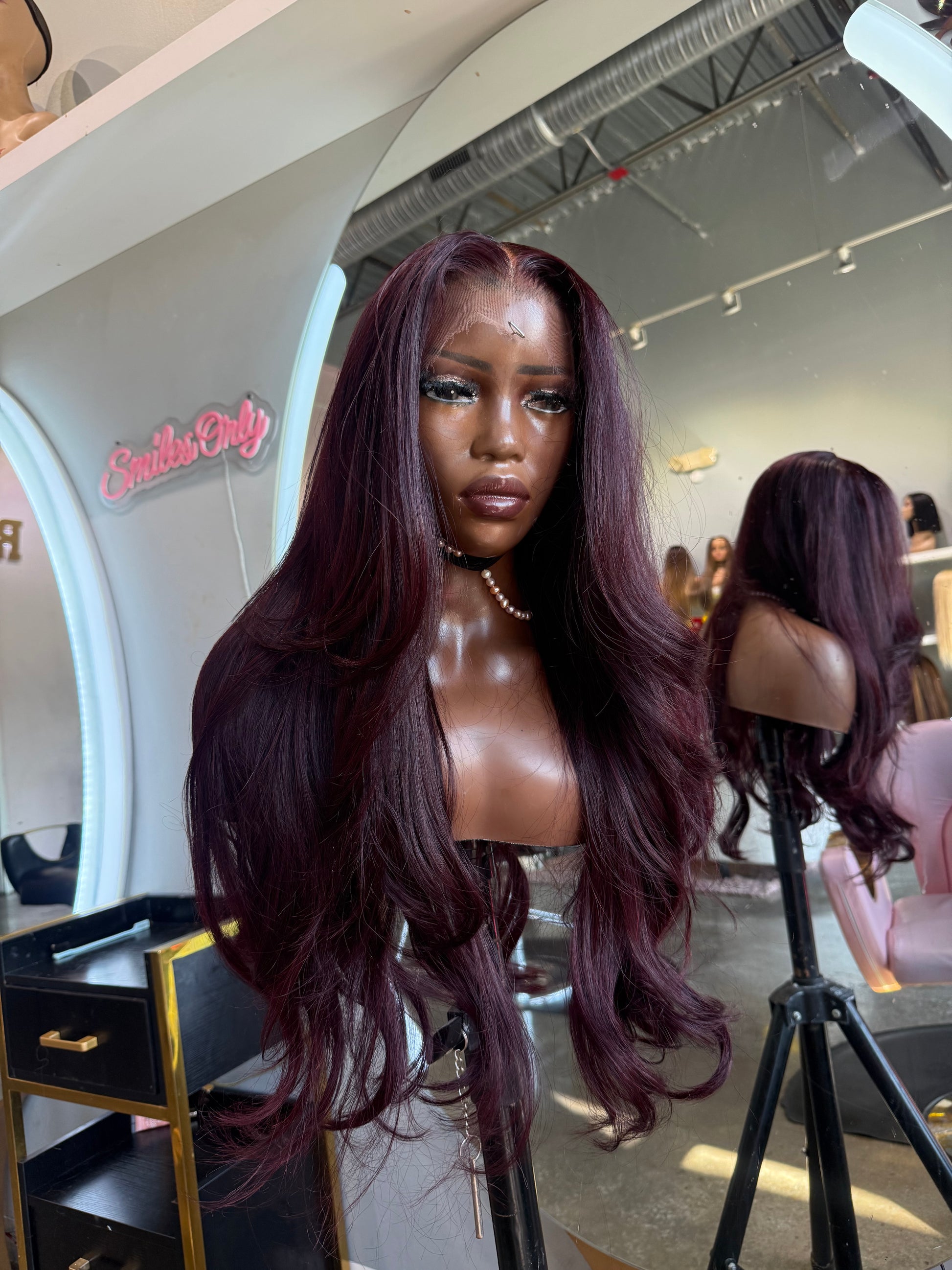 Front right view of lace frontal dark burgundy wig made with 3 bundles.