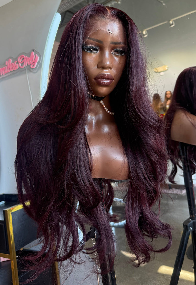 Front right view of lace frontal dark burgundy wig made with 3 bundles.