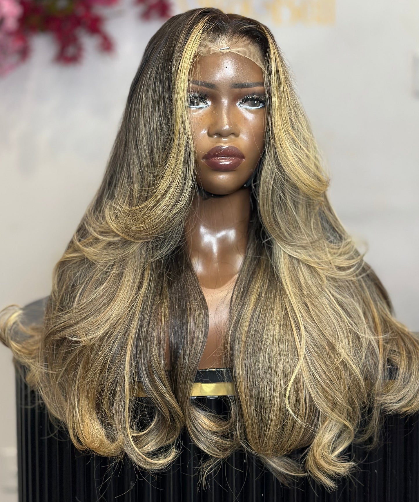 Front view of 100% raw Indian hair wig with highlights.