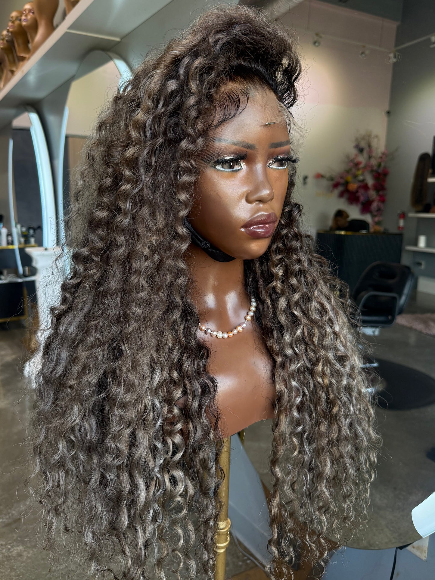Front right view of raw deep wave highlights wig.