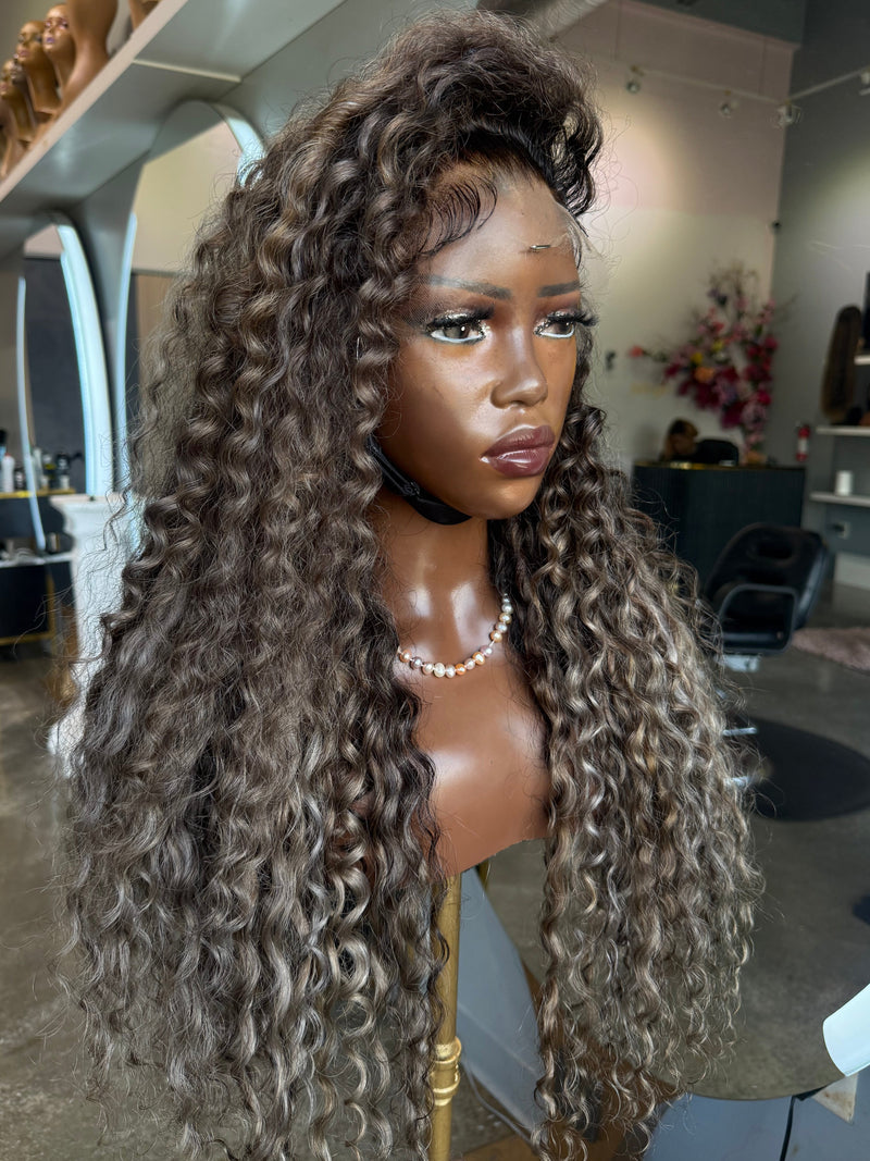 Front right view of raw deep wave highlights wig.