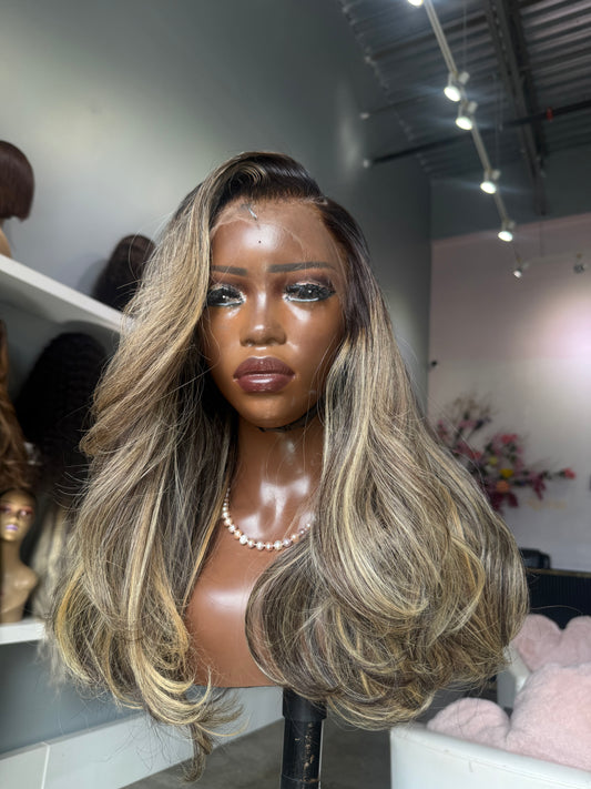 Straight raw Vietnamese hair with mixed highlights.