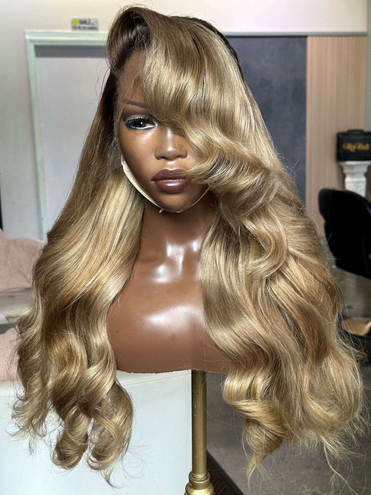 Front view of blonde Burmese hair wig. 