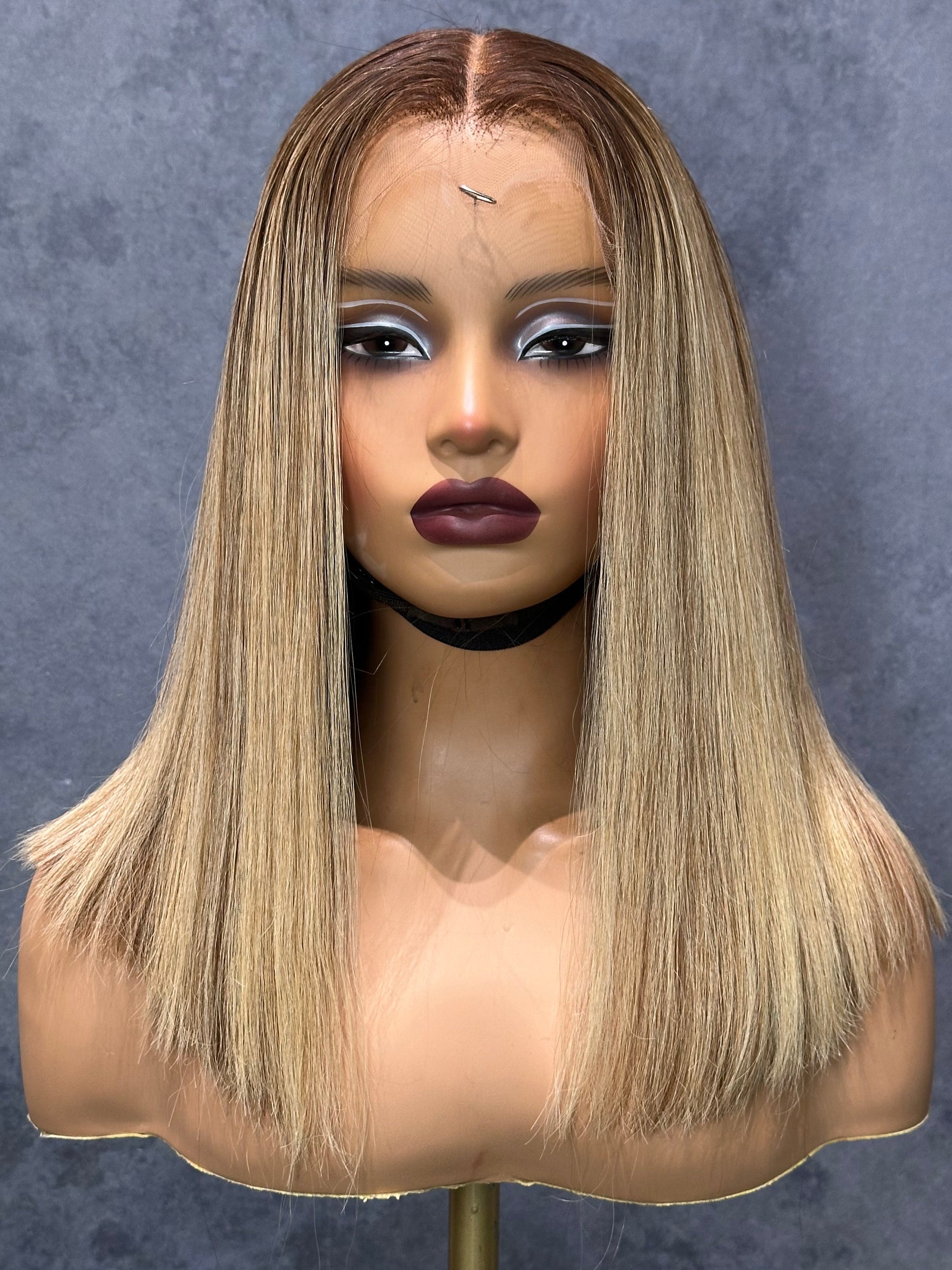 Front view of raw hair bob with middle part and lace frontal 13x4.