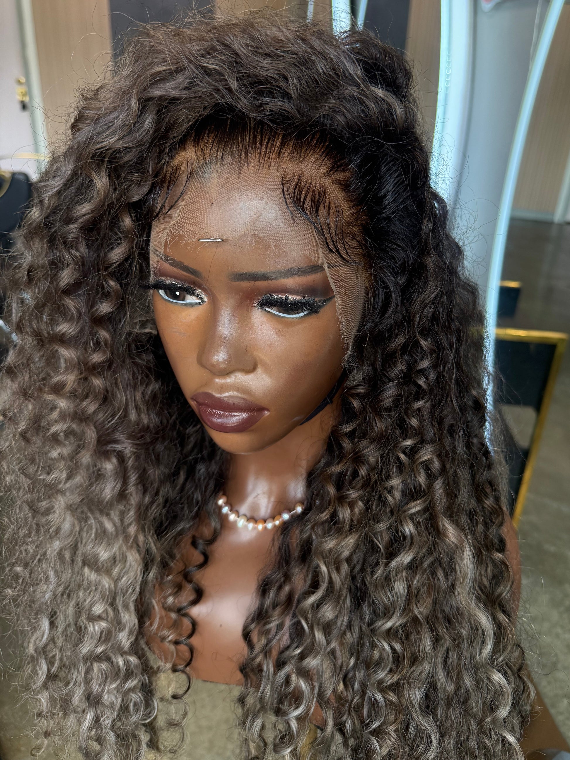 Close-up view of lace frontal 13x4 on raw hair wig made with 3 bundles.