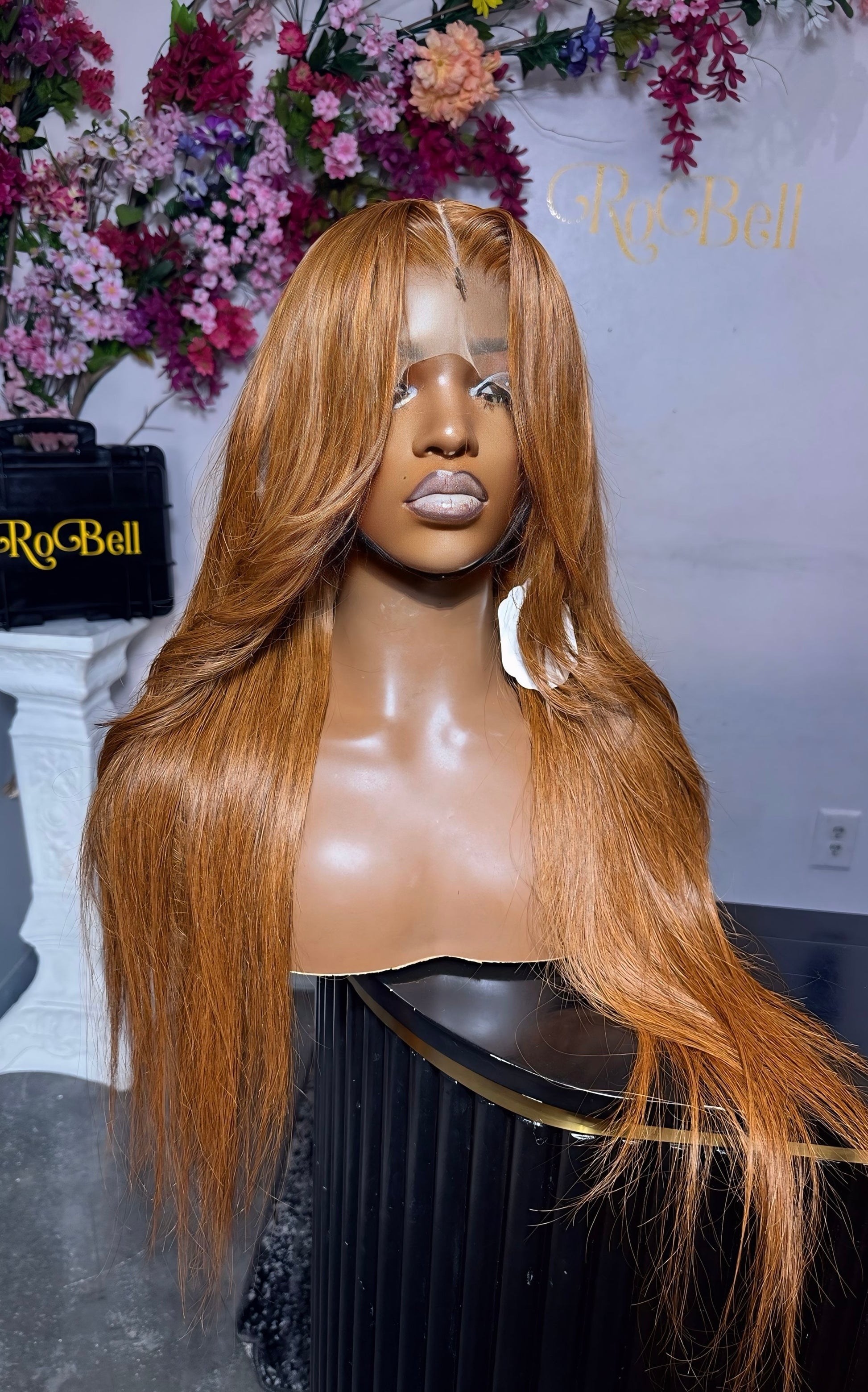 Straight copper colored wig.